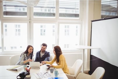 three team members collaborating