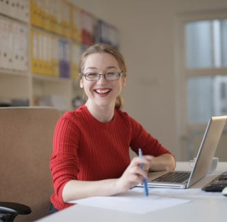 smiling woman red sweater